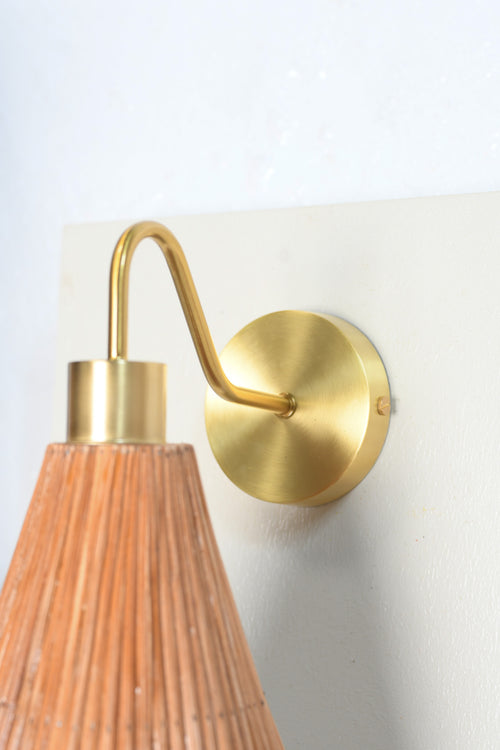 "Cone rattan wall sconce, front view, natural rattan cone shade, studio white — Rattanology"
