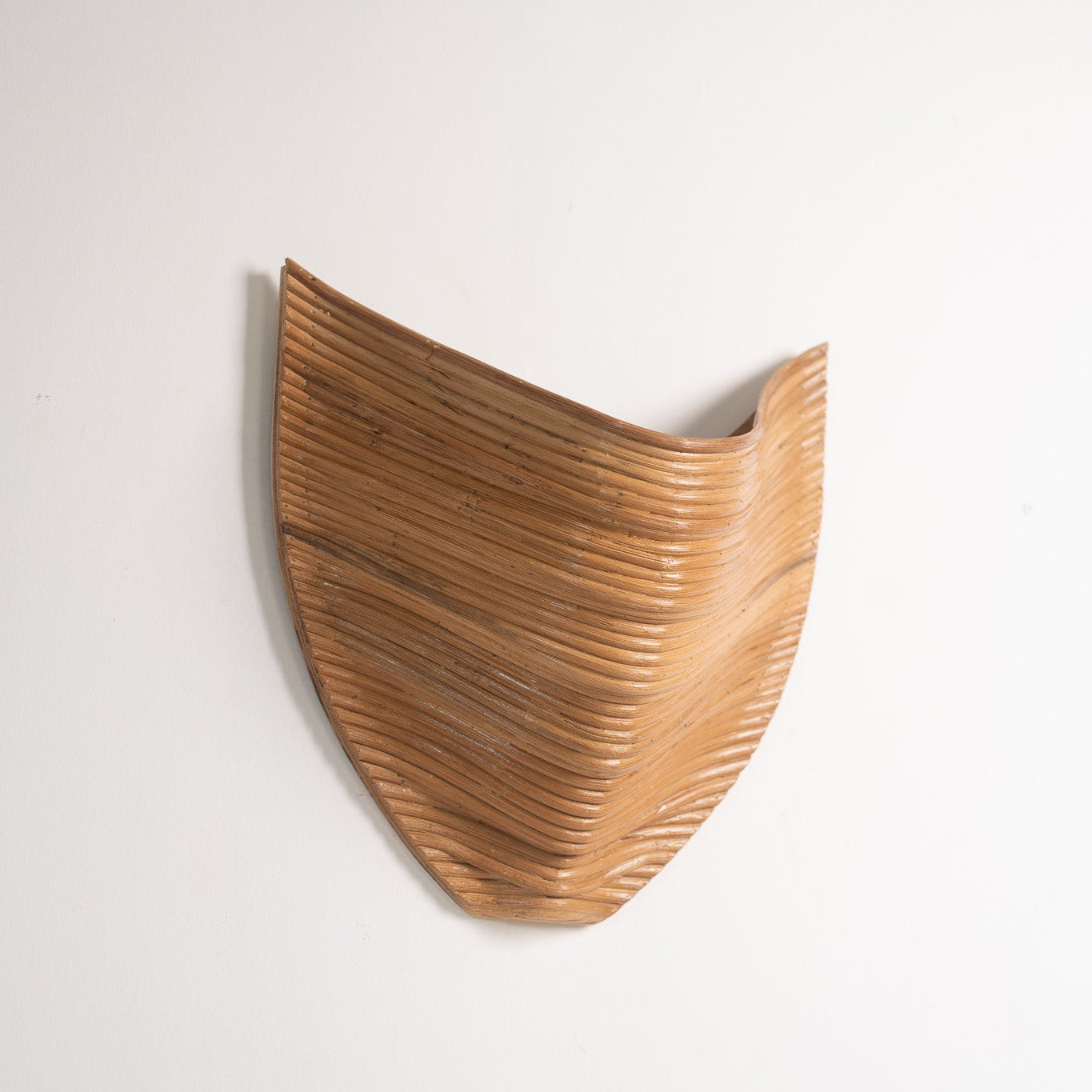 Aurora Sculptural Wall Sconce — full view, handcrafted rattan, Rattanology