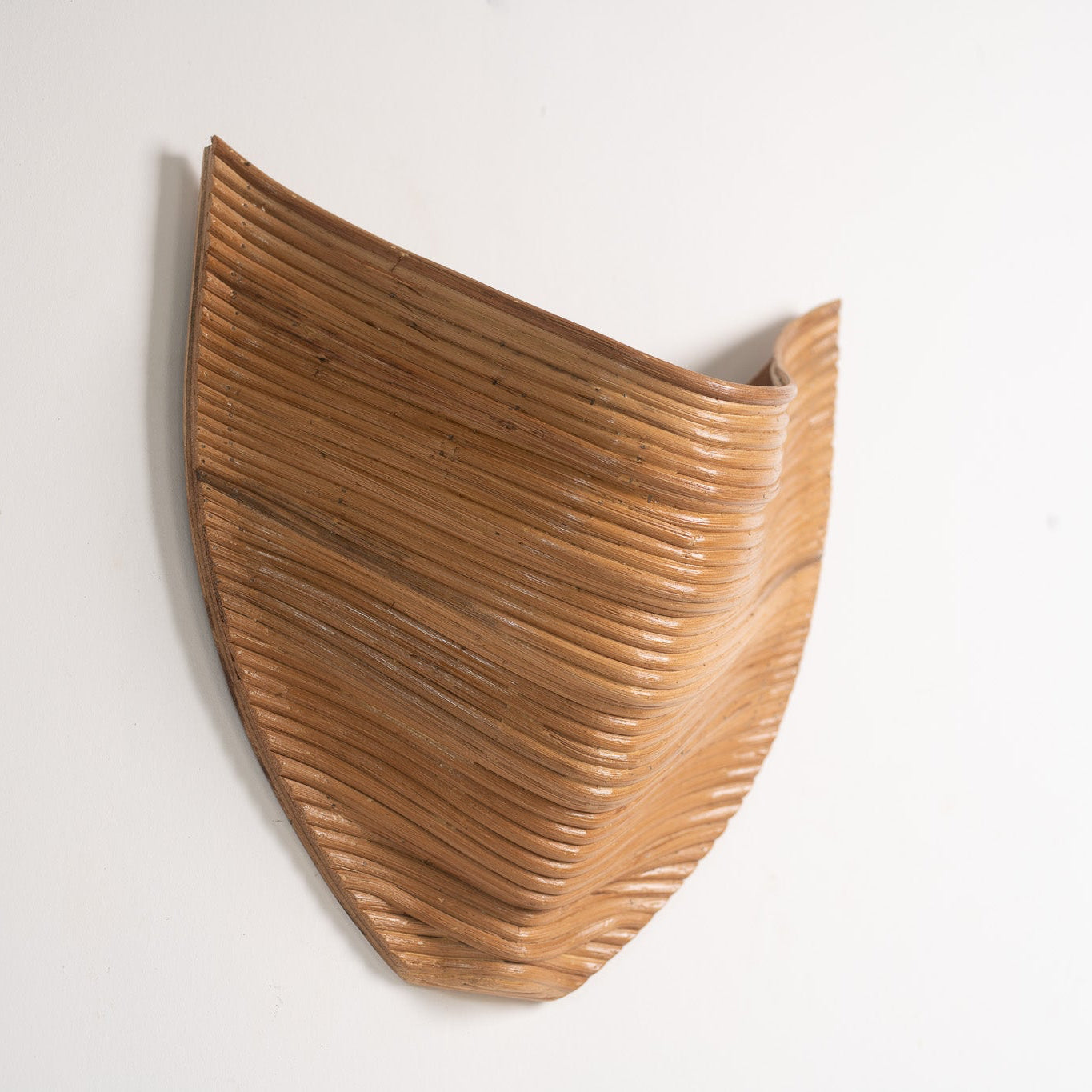 Aurora Wall Sconce by Rattanology — upward ambient light, ceiling shadow play