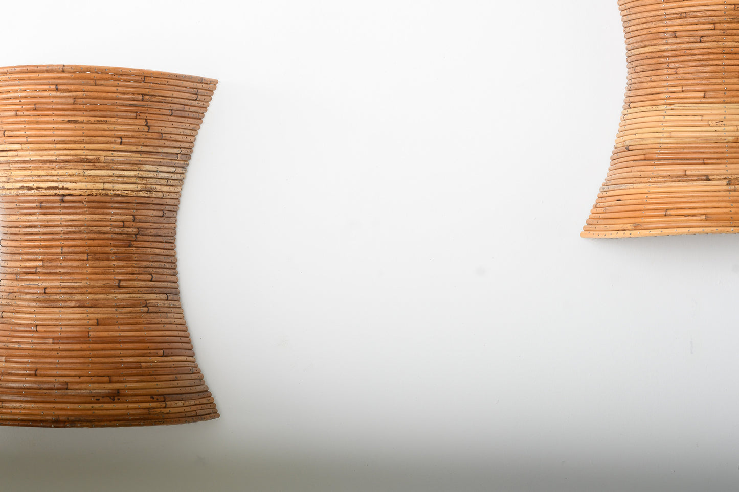 Pair of Hour Glass Shaped Rattan Wall Sconces