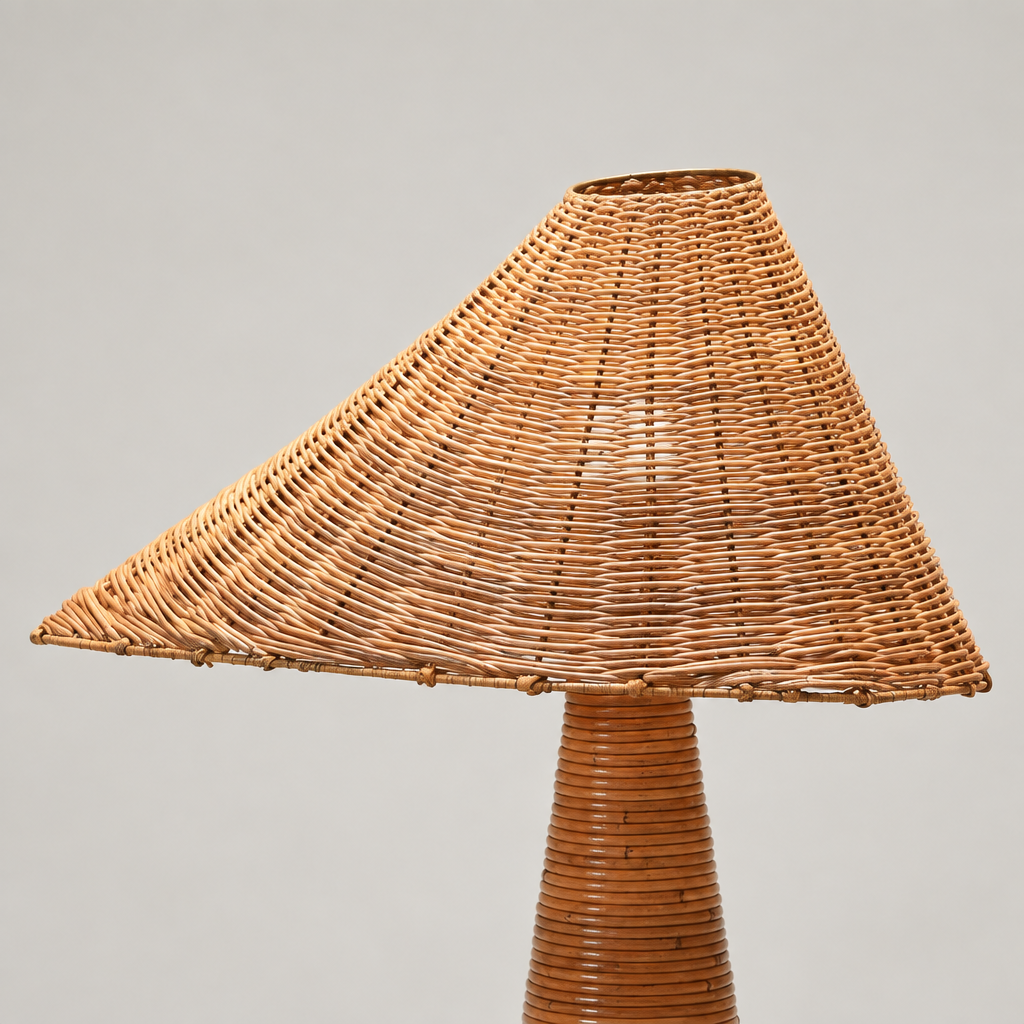 Close-up of Chloe’s asymmetric woven rattan shade, showing its open top and sloping rim.
