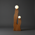 Bella rattan floor lamp on darker grey background
