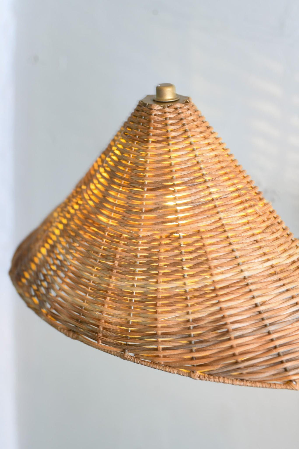Hand-woven wicker cone rattan wall sconce natural weave detail — Rattanology