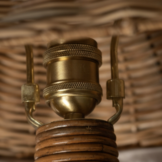 Close-up detail of brass E27 fitting on a handcrafted rattan mushroom lamp — Rattanology Shroom Collection