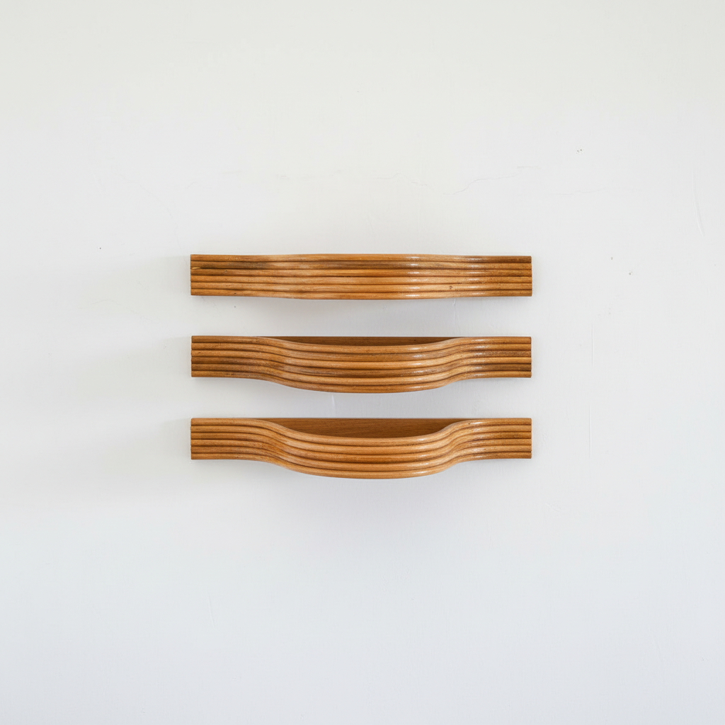 Three Rattan Bent Wall Shelves Close Together